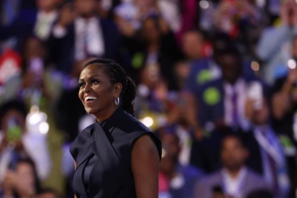 Michelle Obama takes to the stage during the second day of the Democratic Natio<em></em>nal Co<em></em>nvention in Chicago on August 20, 2024.